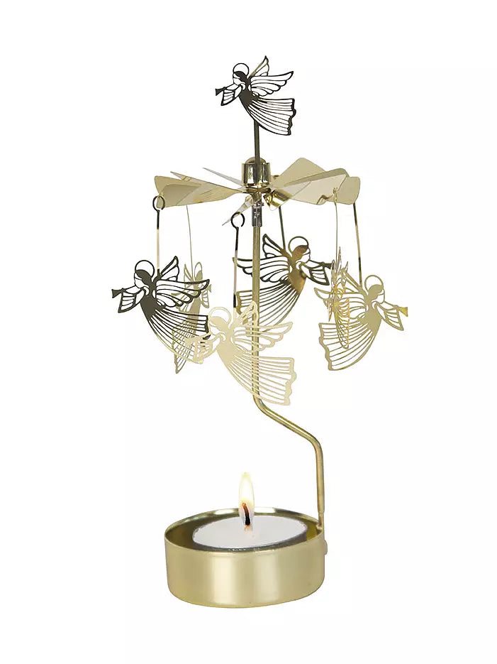 The Tealight Spinner, Flying Angel in Gold by Pluto Design Sweden features graceful flying angels that elegantly spin above a lit tealight candle at the base.