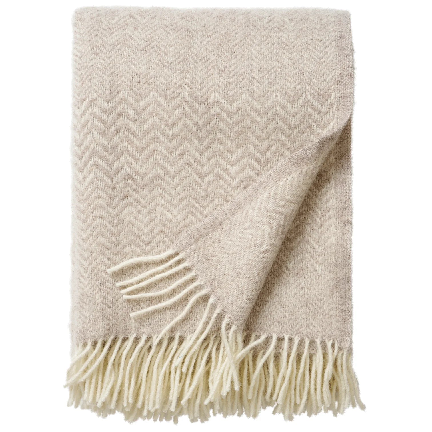 The Klippan Zigzag Throw in Lambswool, Greige features a subtle zigzag pattern and fringed edges—an elegant, cozy accent to enhance your home décor.