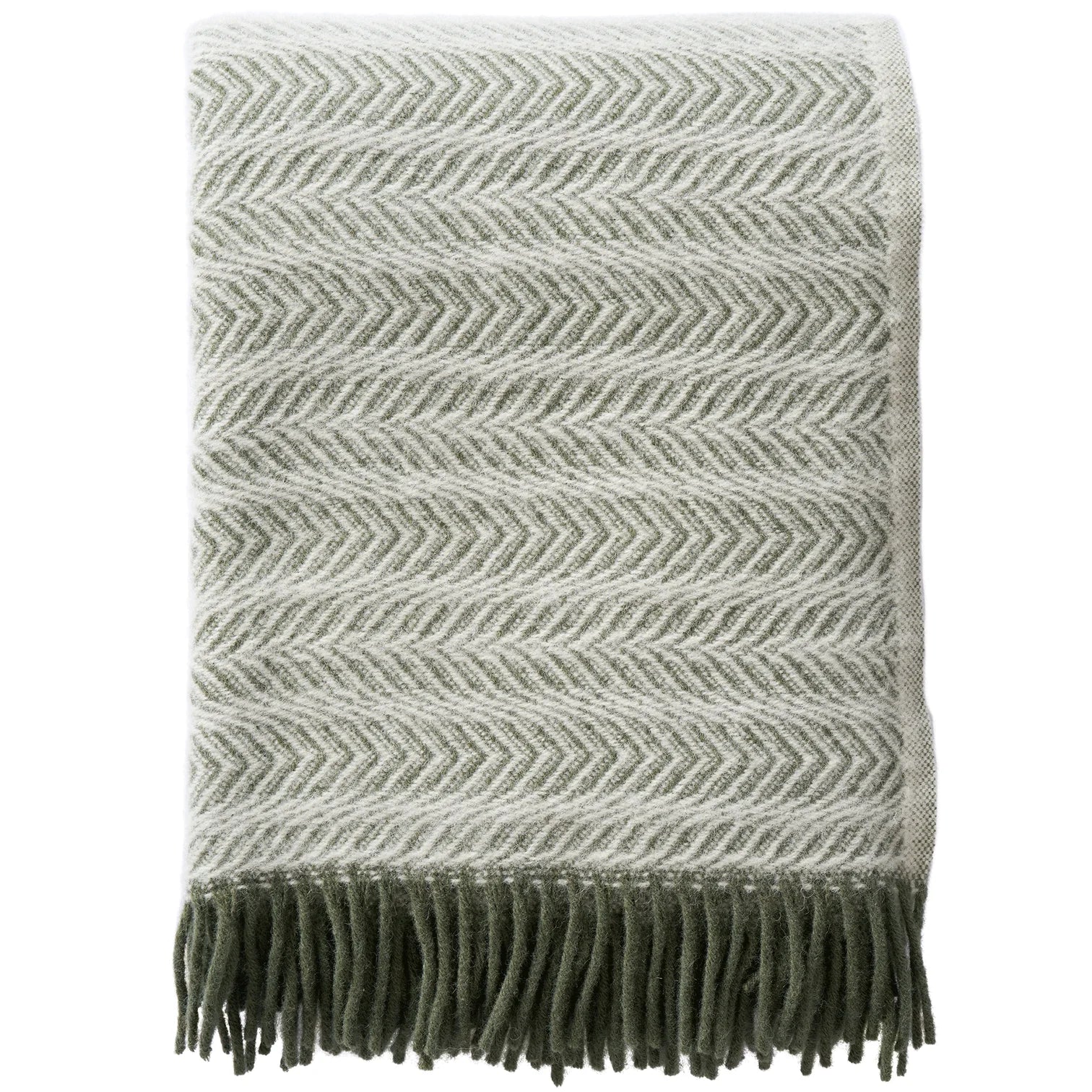 The Klippan Alm Throw in Eco Lambswool, Pine Green features a green and white chevron pattern with fringed edges—ideal for cozy home decor.