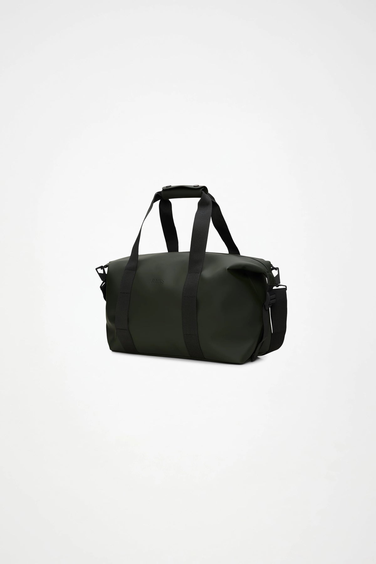 The Rains Hilo Weekend Bag Small in Green by Rains is shown here with black handles and an adjustable shoulder strap, set against a plain white background. This compact travel bag is waterproof, making it both stylish and practical as an overnight or weekend bag for your next adventure.