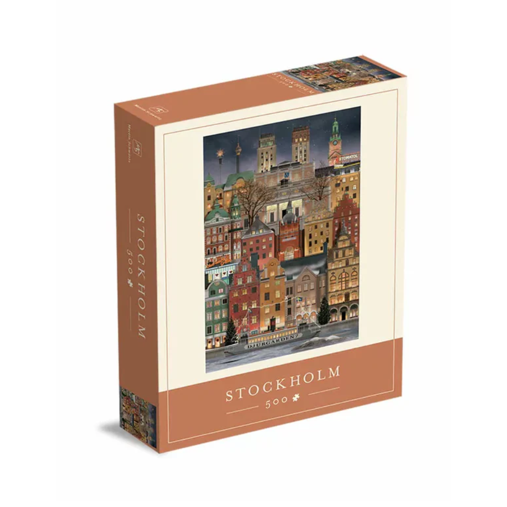 Celebrate the season with the Martin Schwartz "Christmas in Stockholm Puzzle, 500 Pieces," featuring an enchanting illustration of colorful buildings against a night sky, with “Stockholm” and piece count styled on the box front.