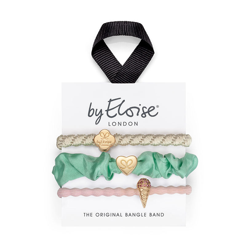 The ByEloise Bangle Band Summer Sorbet Set includes 3 decorative hairbands with heart and ice cream charms, presented on a branded card with a black ribbon—perfect for adding playful style to your look.