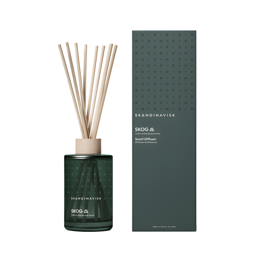 The Skandinavisk Scent Diffuser Skog, 200ml, with wooden sticks, is displayed by its matching dark green rectangular box, evoking the fresh aroma of a Scandinavian boreal forest, set against a white background.