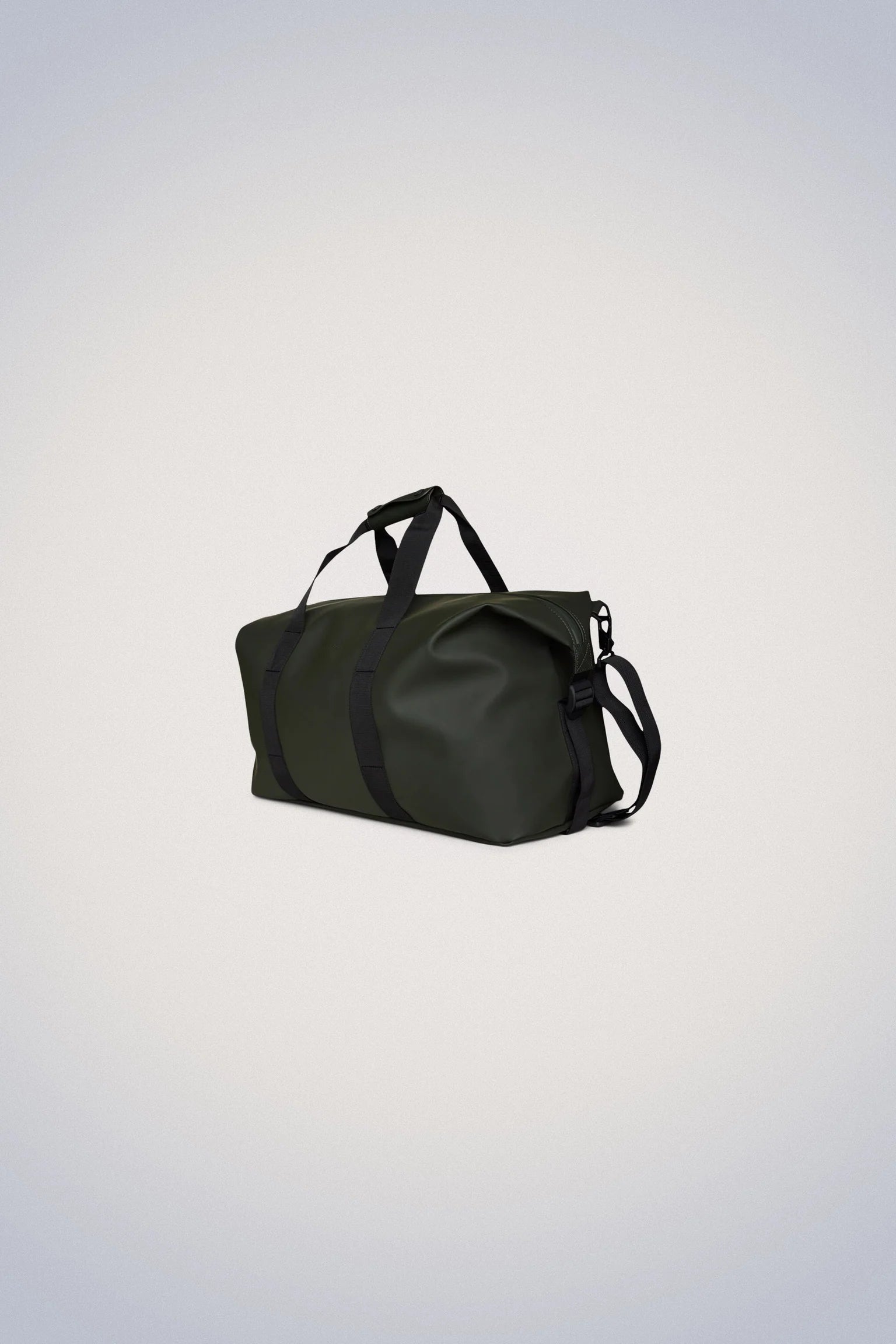 The Rains Hilo Weekend Bag in green, featuring black handles and an adjustable shoulder strap, is crafted from durable PU fabric and showcased against a light gray background.