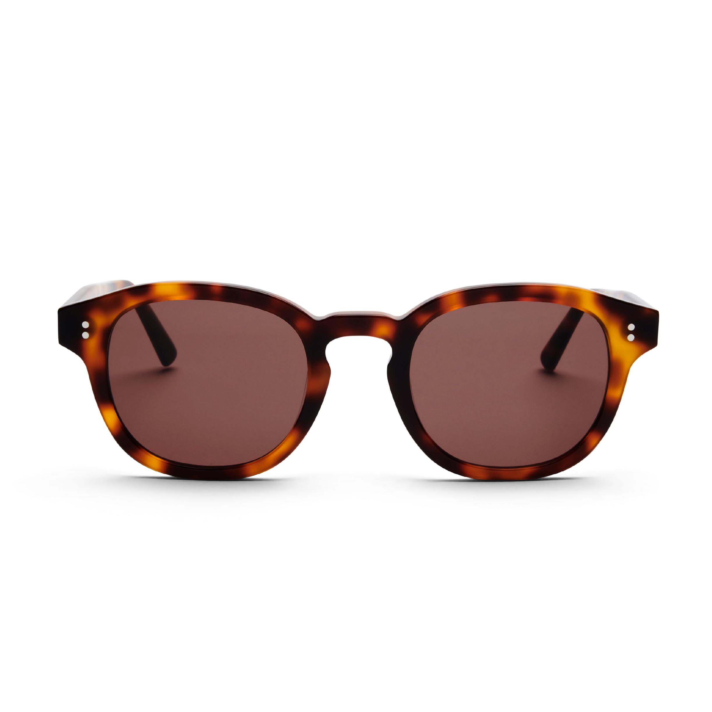 Front view of MESSYWEEKEND Sunglasses Billie in Tortoise with round brown lenses and black temple arms, handcrafted from acetate for style and UV protection, displayed on a plain black background.