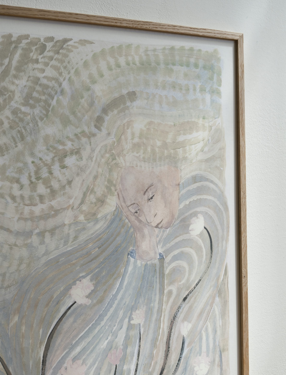 The Grow Print (50x70 cm) by Fine Little Day features Sofia Lind’s artwork of a person with long hair resting their head, surrounded by gentle wavy lines and abstract florals—ideal for adding artistic charm to your space.