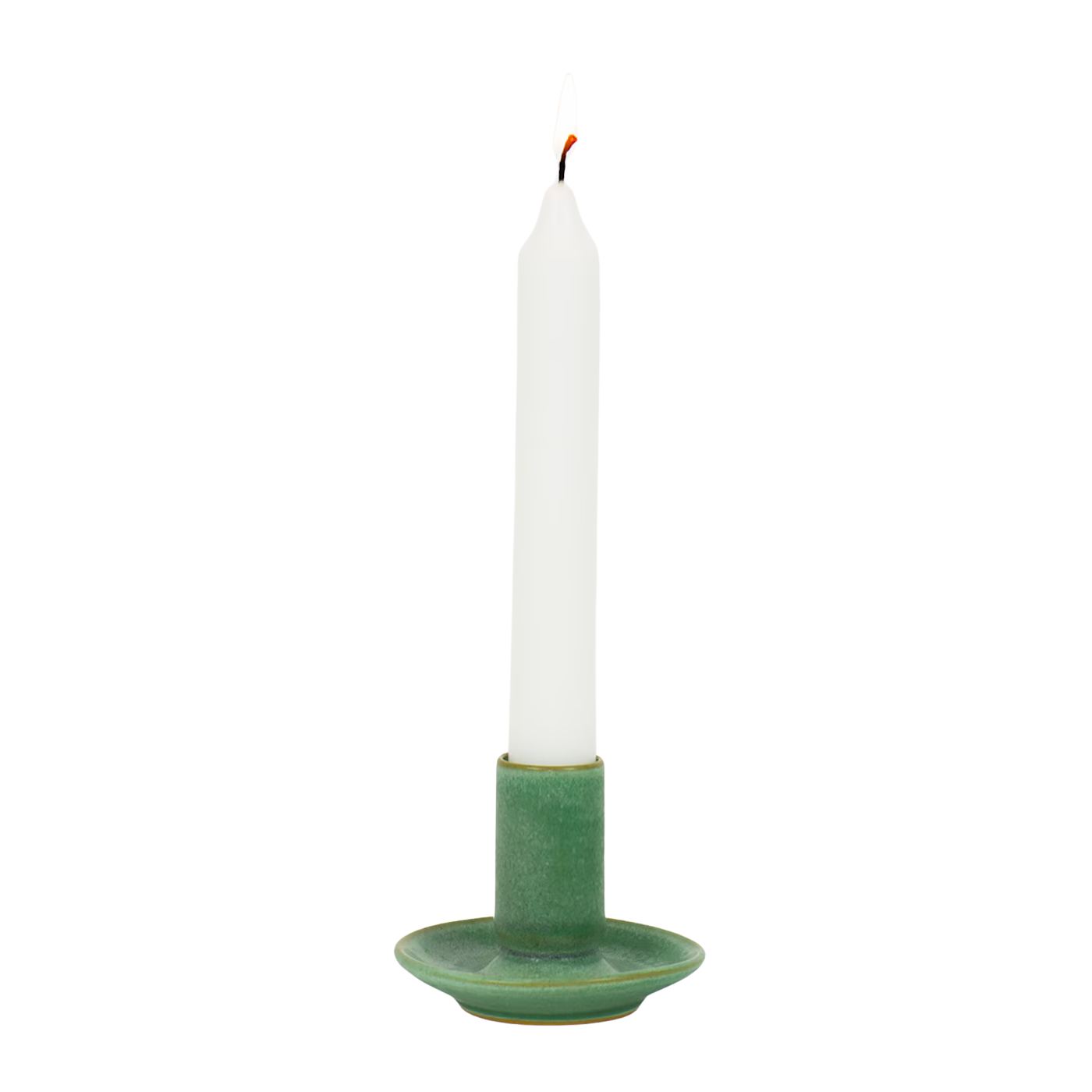 A lit white taper candle sits in the Hera Handmade in Green Candle Holder by A World of Craft, featuring a wide base, against a plain white background.