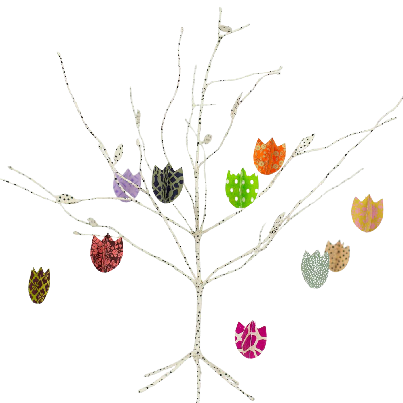 A World of Craft’s Tulip Easter Ornaments in Paper, Set of 10, features colorful tulip-shaped decorations in red, purple, green, yellow, orange, and pink on a bare white branch against a plain white background.