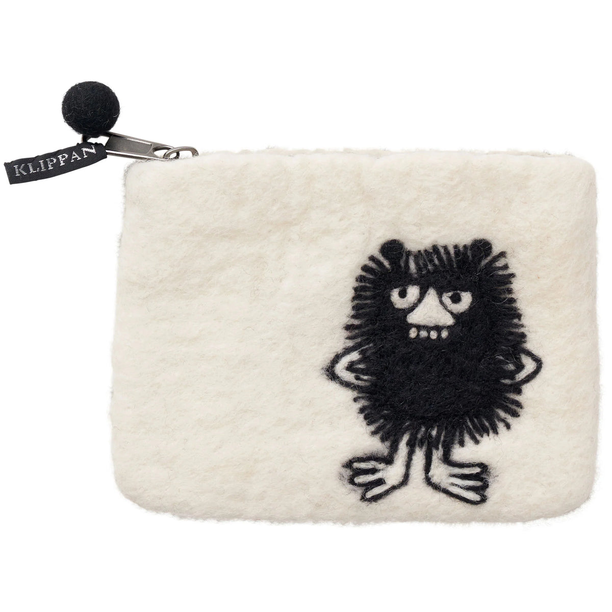 Introducing the Klippan Yllefabrik Felted Wool Purse Stinky in White, Handmade—a whimsical white zip pouch adorned with “Stinky,” the black, fuzzy Moomin character with big eyes, a long nose, and hands on hips. This charming purse features a secure zipper topped with a playful black pom-pom and a KLIPPAN tag. Crafted from handmade felted wool, it’s perfect for adding fun personality to your everyday essentials.