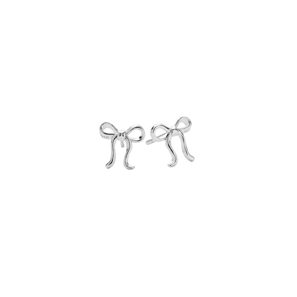 The Bow Stud Earrings in Silver by Pernille Corydon feature a polished finish and feminine design, beautifully displayed on a plain white background—ideal for lovers of elegant jewellery.