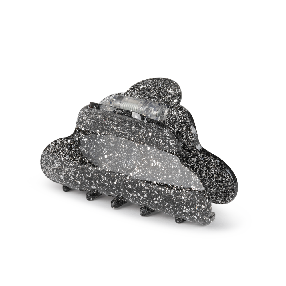 The Lene Glitter Big Hair Claw Clip in Black Diamond by Sui Ava is a large black acetate cloud-shaped clip with a sparkling pattern and silver spring hinge, shown on a plain white background.