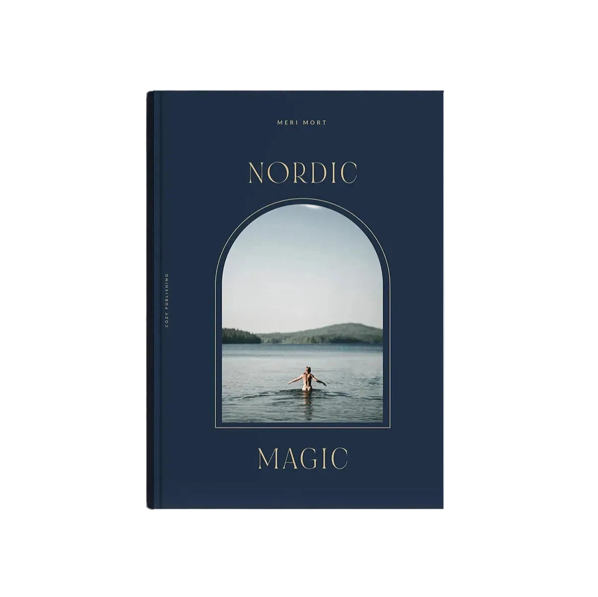 Nordic Magic Book by Cozy Publishing features a dark blue cover with a photo of a person in a lake, surrounded by nature and framed by an arched window, reflecting Nordic traditions and nature worship.