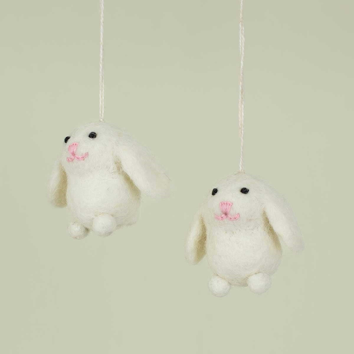 A World of Craft’s Mini Easter Bunnies, set of 2, are handmade wool ornaments with pink noses and black eyes—ideal as fair trade Easter tree decorations.
