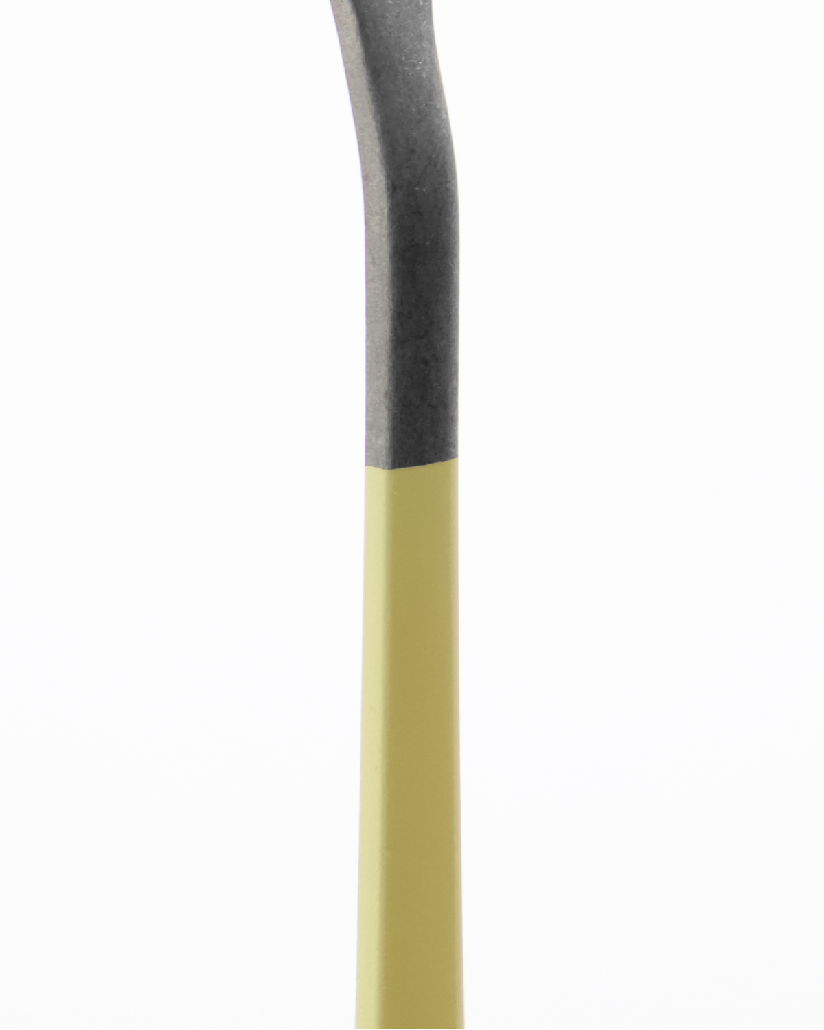 Close-up of the Nicolas Vahé Salad Set in stainless steel with a yellow handle, displayed against a plain white background.