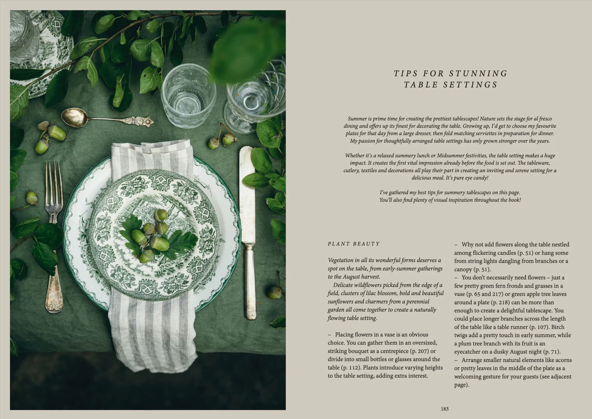 A green and white floral plate, striped napkin, silver cutlery, and greenery evoke Nordic summer recipes from the Nordic Summer Cookbook by Cozy Publishing. The scene rests on a green cloth with leaves and acorns; text is shown on the right.