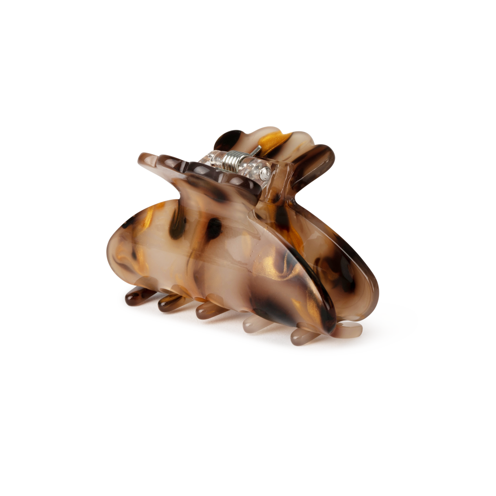 The Sui Ava Helle Pretty Mini Hair Claw Clip in Champagne features a brown and beige tortoiseshell pattern with a metal spring, ideal for fine hair and shown on a plain white background.