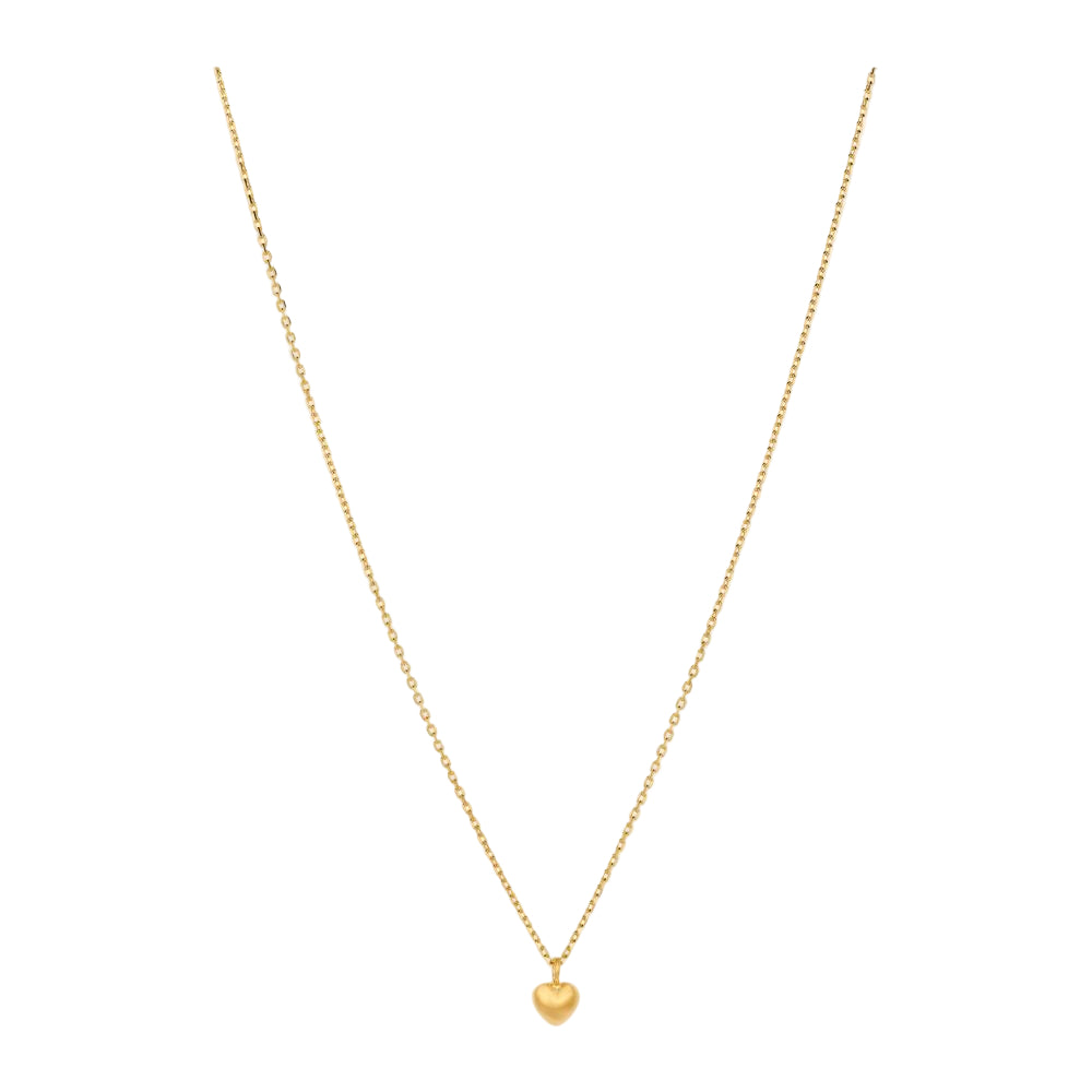 The Pernille Corydon Love Necklace in Gold features a simple heart pendant on a delicate chain, beautifully showcased against a white background—an elegant piece symbolizing love and emotion.