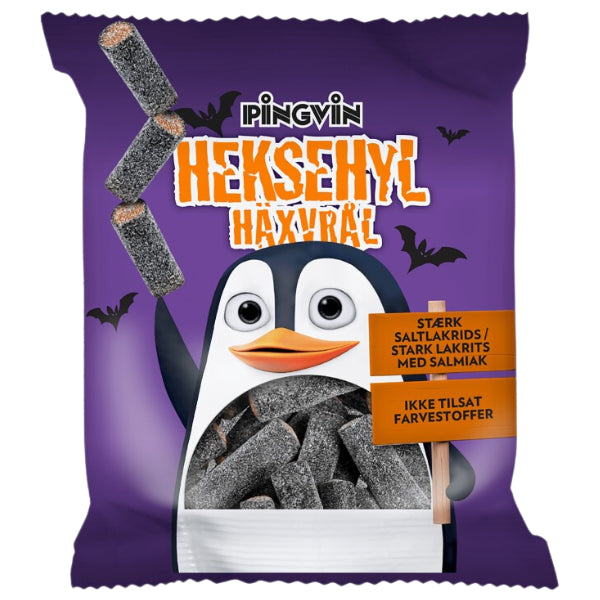 A purple bag of Toms Pingvin Heksehyl Original salted licorice featuring a cartoon penguin, falling licorice tubes, and signs reading Stærk saltlakrids / Stark lakrits med salmiak and Ikke tilsat farvestoffer.