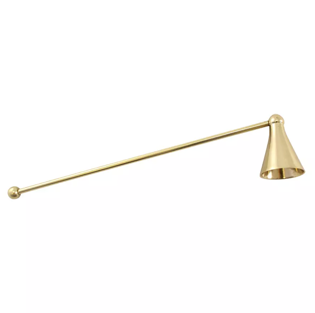 The Strömshaga Candle Snuffer in Brass features a long handle and cone-shaped end, offering a stylish and safe way to extinguish candles.