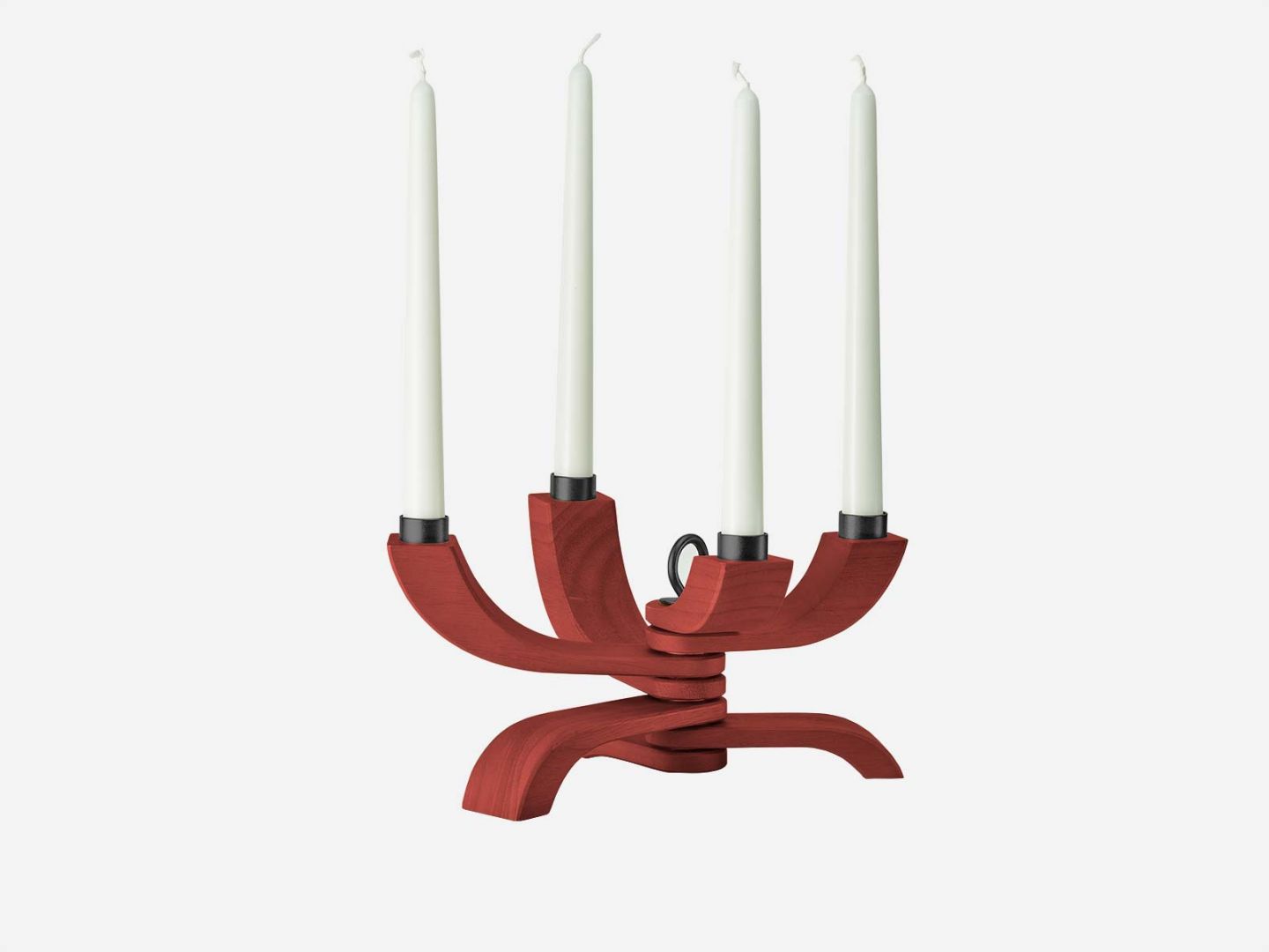 The Nordic Light Candle Holder 4 Arms in Red by Design House Stockholm features four upward-curving arms, each holding a tall white taper candle, displayed against a plain white background.