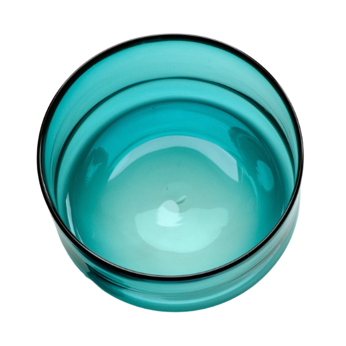 The Handblown Glass Bowl Extra Large in Green by Evelina Dovsten is a striking transparent bowl, ideal as a handmade kitchen centerpiece for any modern home.