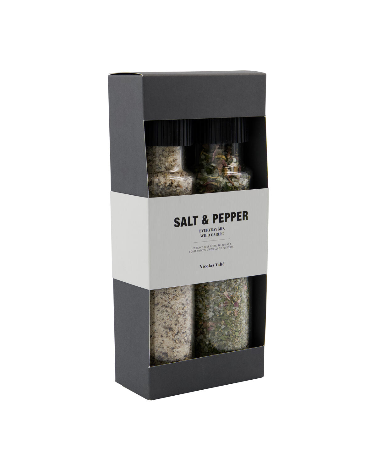 Experience the Nicolas Vahé Gift Box: Everyday Mix Salt & Pepper and Wild Garlic Salt. This sleek black and white set features two elegantly boxed glass bottles, each with a distinctive white band label—one filled with Everyday Mix Salt & Pepper, the other with aromatic Wild Garlic Salt. An ideal gift for elevating everyday flavors.