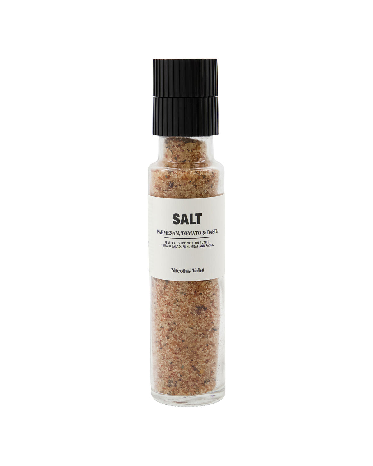 A clear glass grinder from Nicolas Vahé, filled with the Salt, Parmesan, Tomato & Basil blend—a coarse, brownish gourmet sea salt featuring classic Mediterranean flavors of parmesan, tomato, and basil—finished with a sleek black lid and an elegant white label.