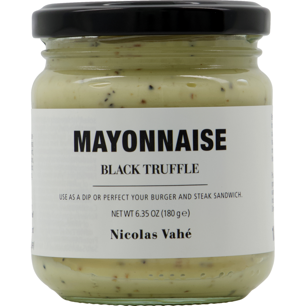 A jar of Nicolas Vahé Mayonnaise, Black Truffle features a black lid and a white label with product details, recommending this rich truffle mayo as a dip or for adding flavor to burgers and steak sandwiches.