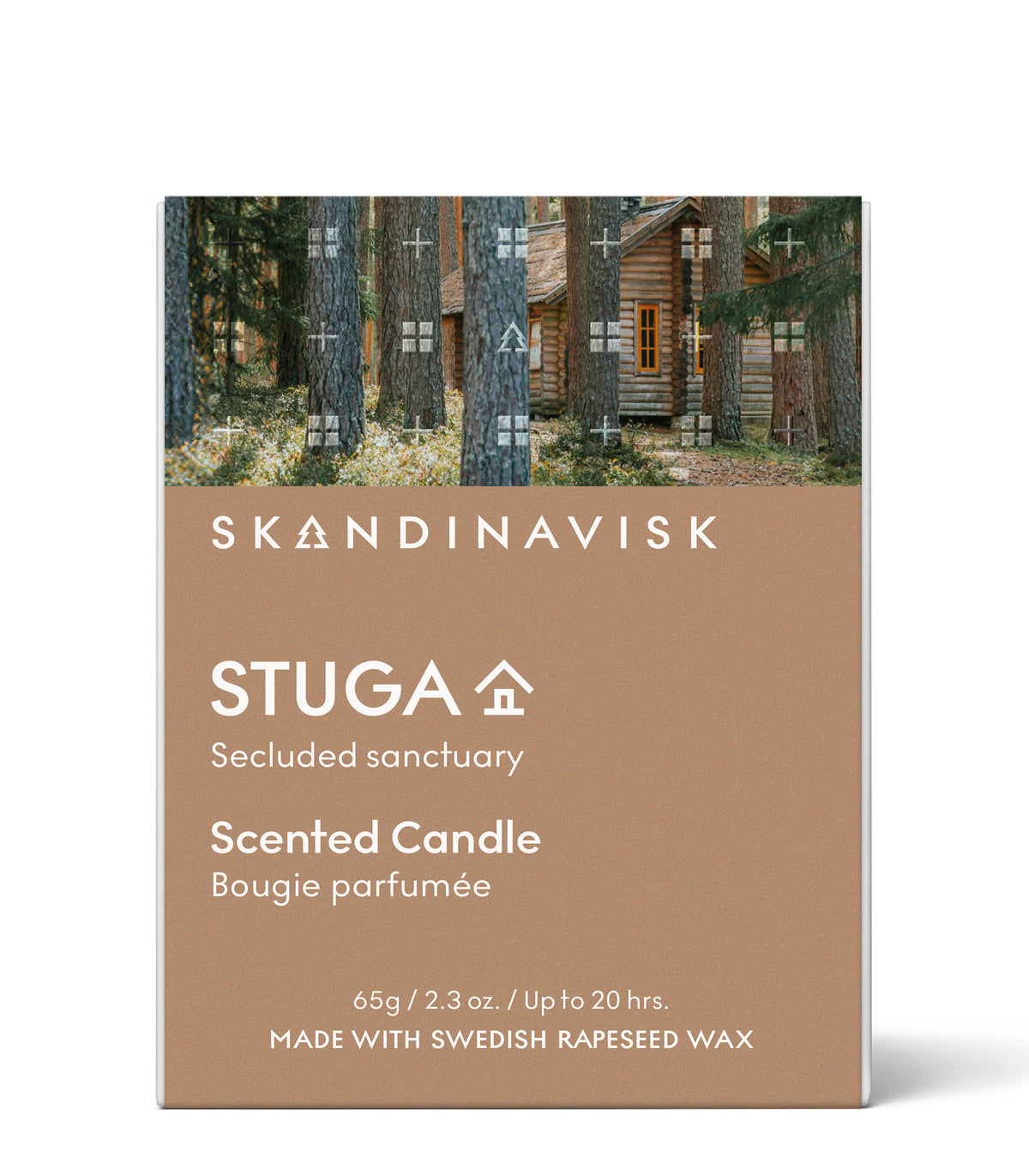 A box of Skandinavisk Seasonal Scented Candle Stuga (65 g), labeled “Secluded Sanctuary.” The packaging features a cabin in the woods and notes that it’s made with Swedish rapeseed wax, filling your space with the calming scent of birch bark and woodland mosses, and burns for up to 20 hours.