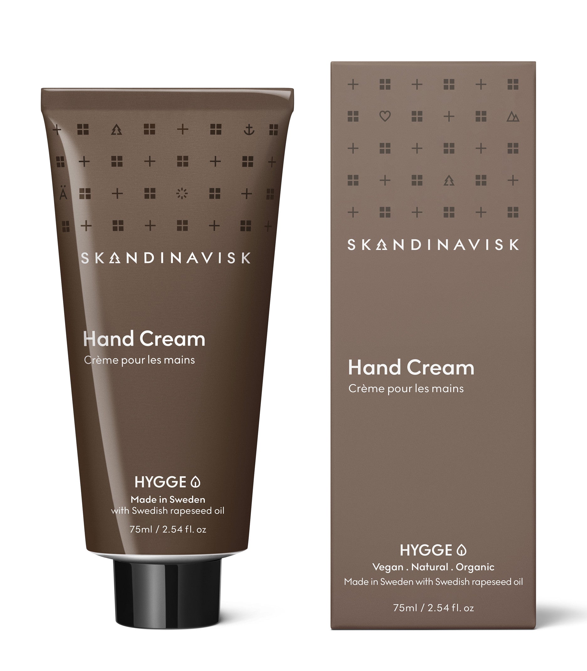 A 75ml tube of Skandinavisk Hand Cream Hygge with a matching brown box, labeled as a vegan, natural and organic moisturizer, made in Sweden with nourishing Swedish rapeseed oil and organic aloe vera.
