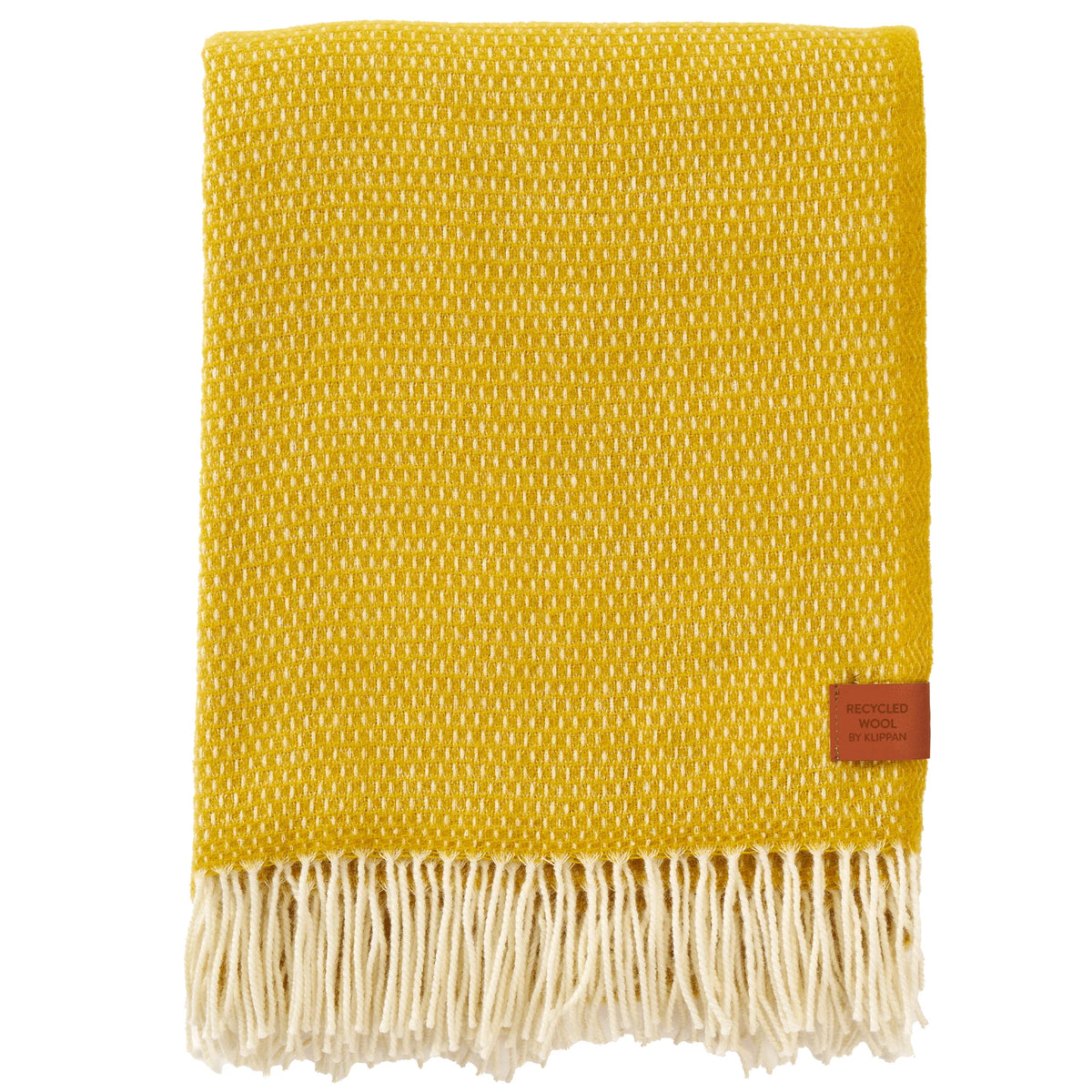 Displayed on a white background, the Hugo Recycled Merino & New Merino Brushed Throw in Saffron Yellow by Klippan Yllefabrik features a folded yellow woven design with white fringe and a small brown tag in the corner. Crafted from recycled and new merino wool, this luxurious throw brings refined interior detail to any space.