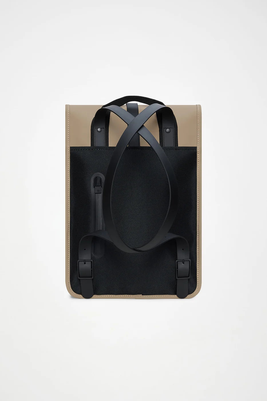 The Rains Backpack Mini Bag in Beige by Rains is a rectangular commuter backpack, shown from the back. It has black adjustable shoulder straps arranged in a crisscross pattern and a top handle. The background is plain white.