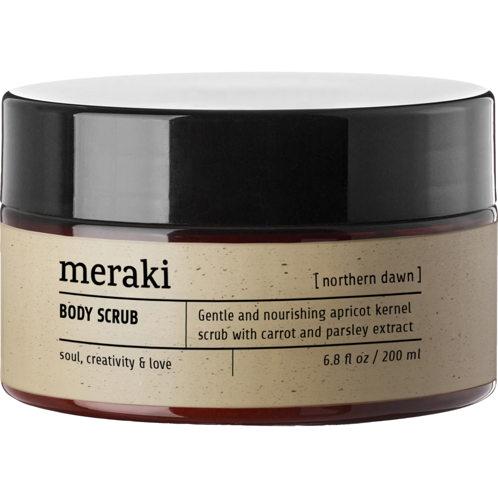 A 6.8 fl oz (200 ml) jar of Meraki Body Scrub Organic, Northern Dawn, with a dark brown lid and beige label. This gentle apricot scrub with carrot and parsley extracts exfoliates and refreshes with an uplifting scent.