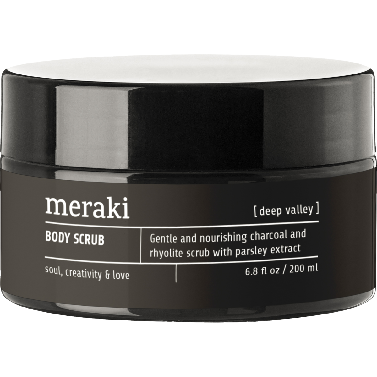 A black Meraki jar labeled Body Scrub, Deep Valley, 200 ml describes it as a gentle charcoal body scrub with parsley extract for deep-cleansing and exfoliation.
