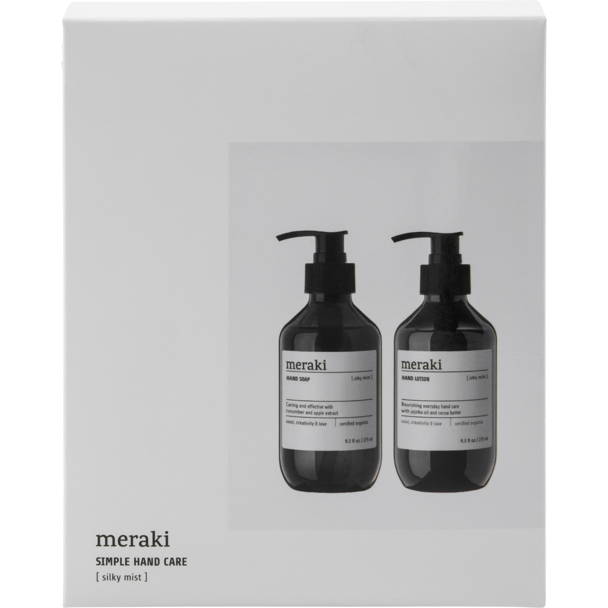 A white box displays two black Meraki pump bottles, labeled as the Gift Box Silky Mist Hand Care Set with Hand Soap & Hand Lotion. The box reads “meraki SIMPLE HAND CARE [silky mist]”.