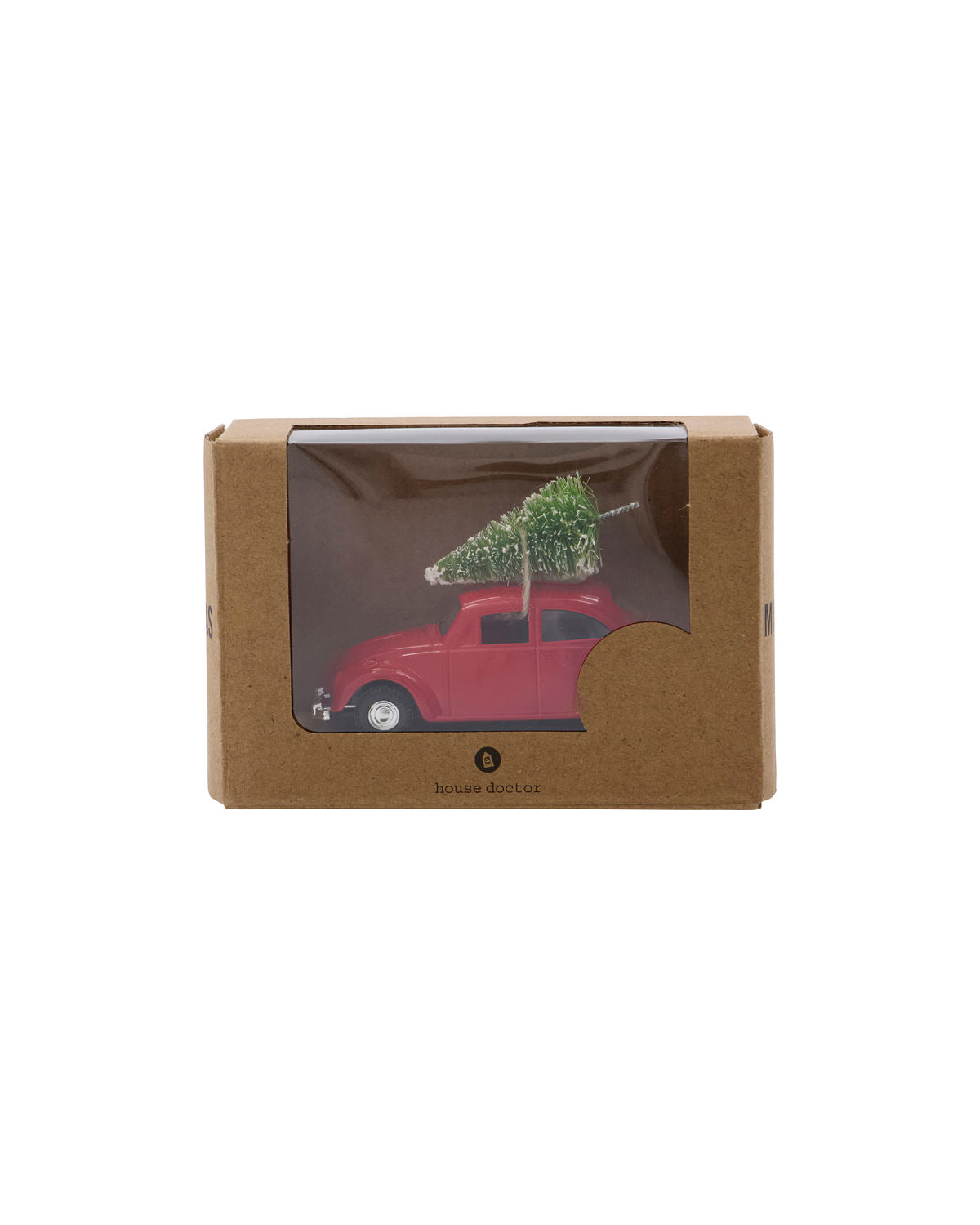 The House Doctor Ornament Mini Xmas Car Christmas Decoration in Red features a mini car with a tree on its roof, perfect as a festive décor or ornament. It comes in a brown cardboard box with a clear plastic window.