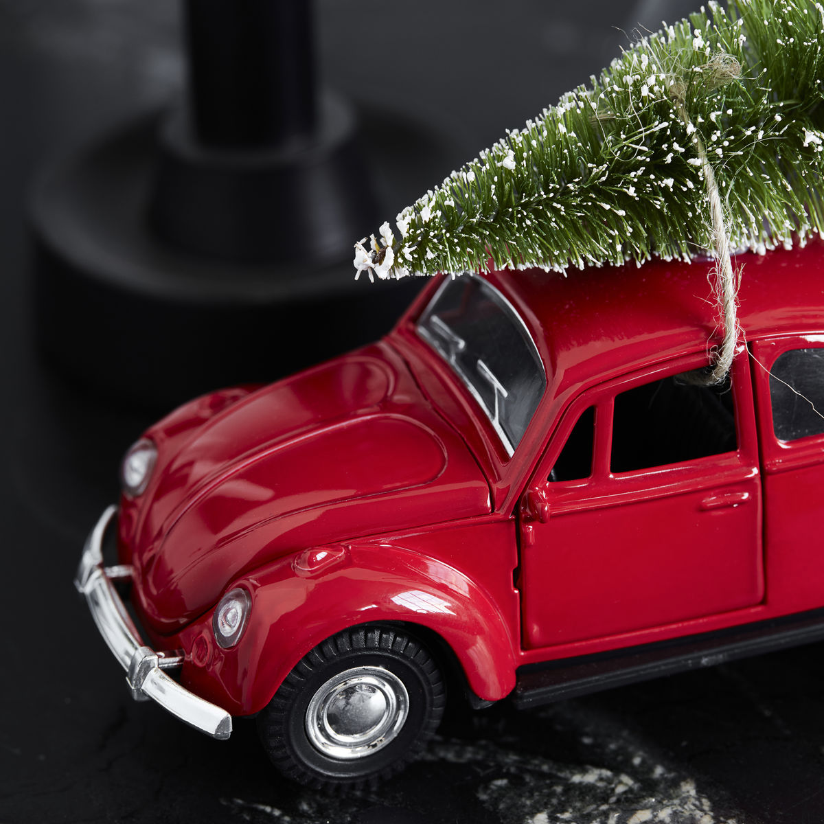 Add festive charm with the House Doctor Ornament Xmas Car Christmas Decoration in red, featuring a small, green, snow-dusted tree on its roof—perfect for nostalgic holiday décor.