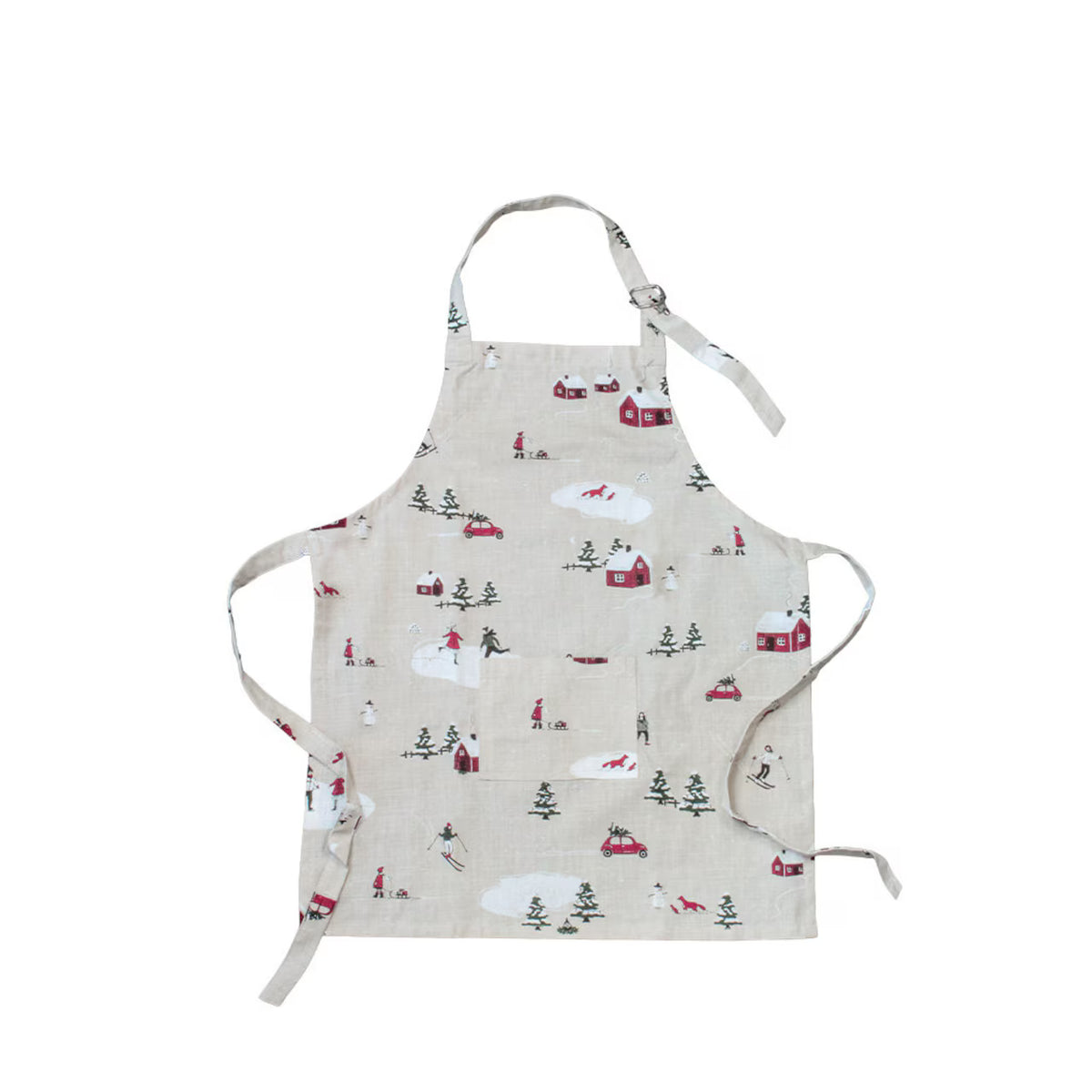 The Strömshaga Children’s Apron Winter Land (Vinterland) is a beige organic cotton apron decorated with winter-themed illustrations such as houses, trees, skiers, and snow. It features a neck loop and two side ties for easy adjustment and secure fastening around the waist.