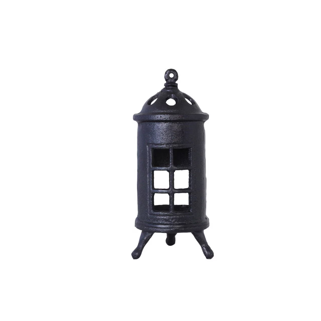 The Strömshaga Stove Candleholder for Tea Lights is a small, black, cylindrical cast iron holder with four legs, window-like cutouts, and a domed top with loop—ideal for vintage décor.
