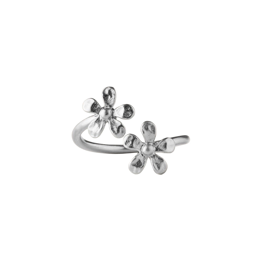 The Wild Poppy Ring in Silver by Pernille Corydon features an open band with two silk-brushed poppy-shaped flowers at each end—a stylish choice for summer jewelry lovers.