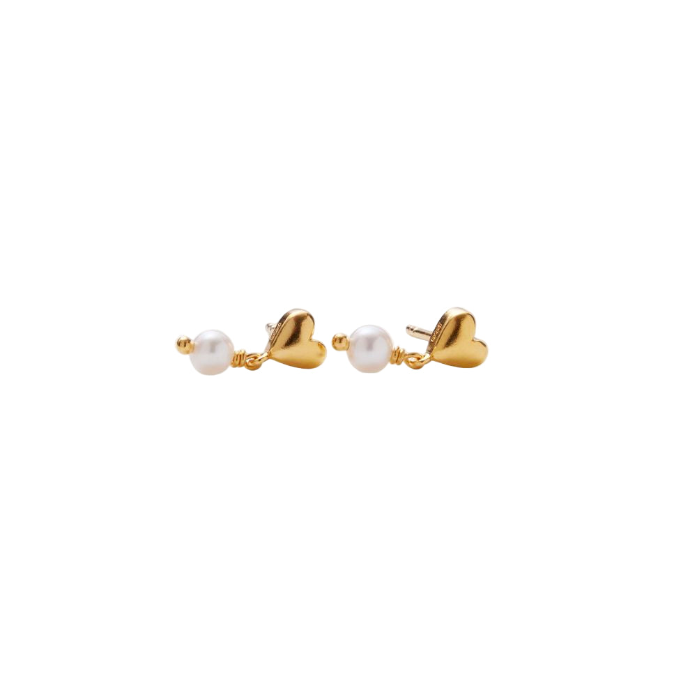 The Pernille Corydon White Adore Earrings in Gold feature heart shapes and round freshwater pearls, shown on a white background.