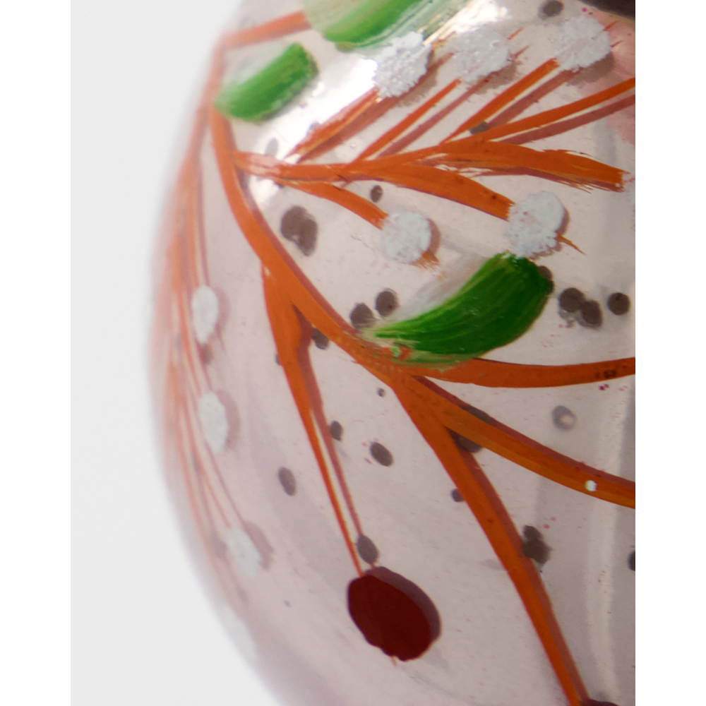 Close-up of a House Doctor Christmas Ornament Baubles Set of 4, Antique Pink handpainted glass ornament decorated with orange branches, green leaves, and white berry accents.