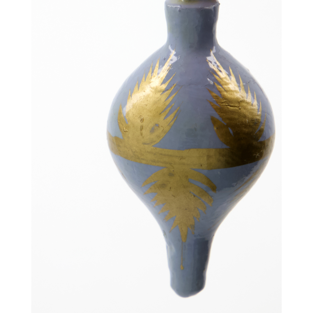 Handmade teardrop-shaped Christmas Ornaments Stero Set of 6 in light blue with painted gold leaf motifs and a painted finish.