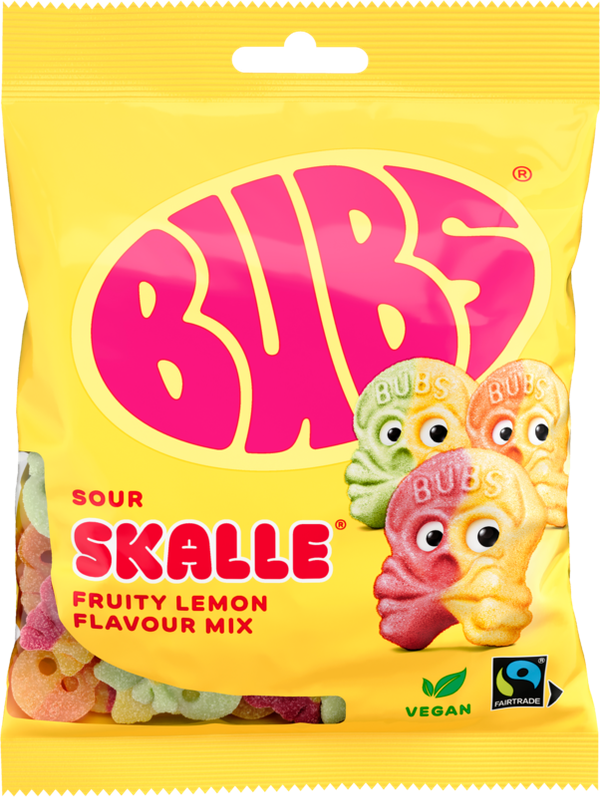 A yellow bag of Deli Bubs Sour Lemon Mix Swedish Candy Skulls 90g, featuring colorful skull-shaped candy on the front and vegan and Fairtrade symbols in the bottom right corner.