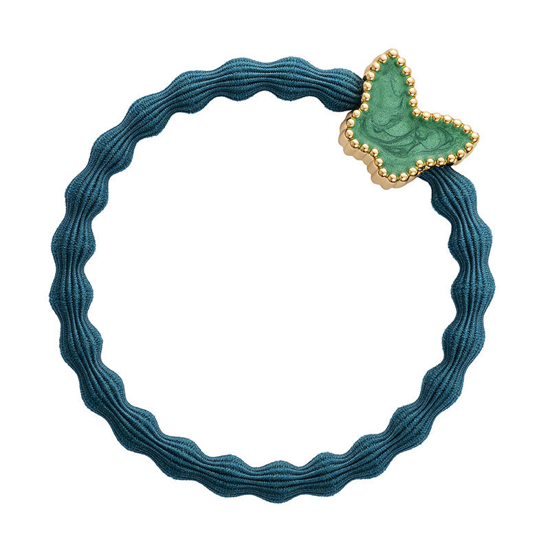 The ByEloise Bangle Band in Bottle Green features a wavy elastic design with a green and gold enamel butterfly charm for added elegance.