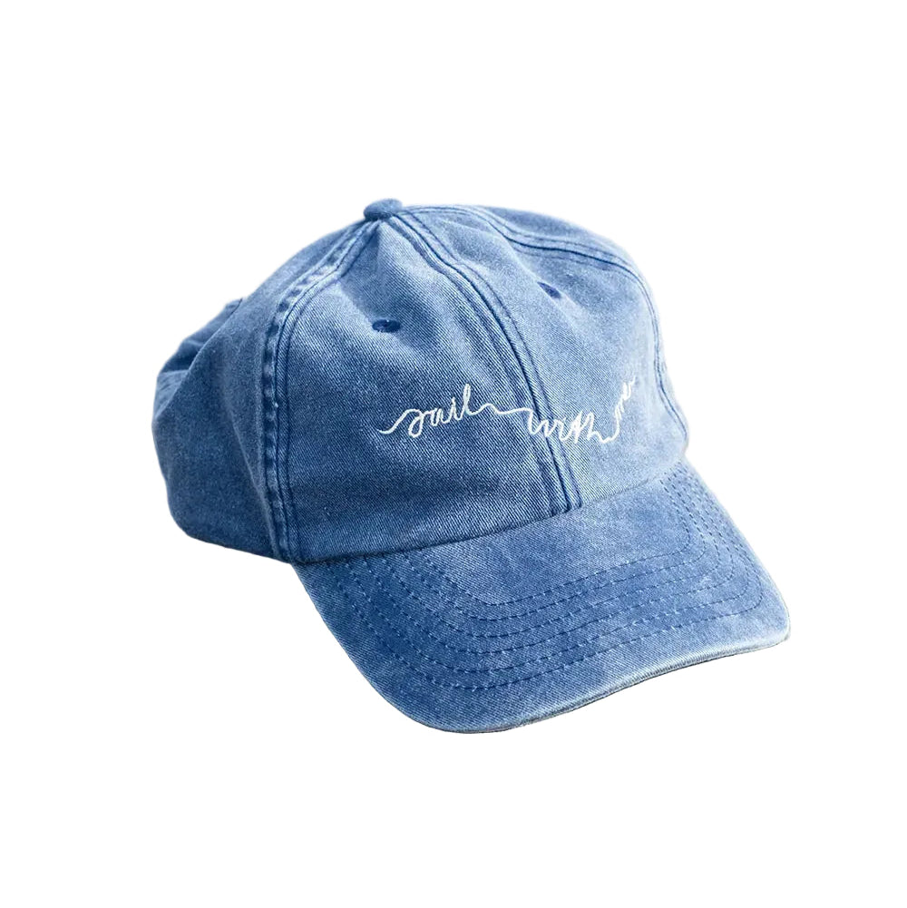 The Fine Little Day Sail With Me Cap Embroidered in Vintage Denim is a blue cap with visible stitching, a curved brim, and white "soul" embroidery on the front—offering effortless, casual style for any adventure.