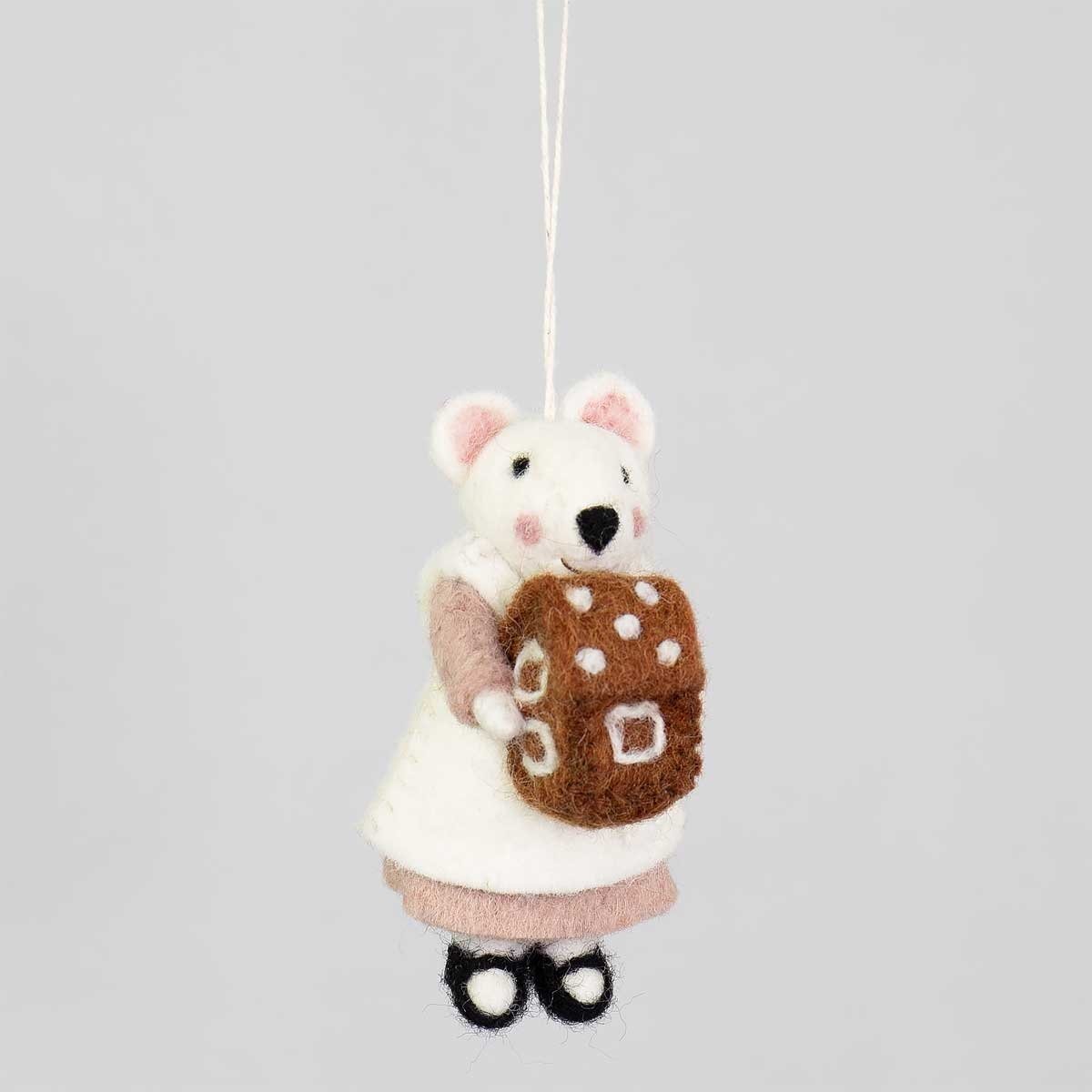 The Wool Mouse w. Gingerbread House Christmas Ornament by A World of Craft measures 11 cm and features a felt mouse in a dress and apron, holding a gingerbread house—perfect for adding Fairtrade charm to your holiday decor.
