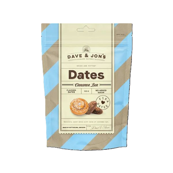 A beige and blue striped pouch of Blabar Nordic Living's Dave & Jon’s Dadlar Cinnamon Bun Flavoured Dates 125g features a cinnamon bun and dates, highlighting this healthy, no added sugar snack.