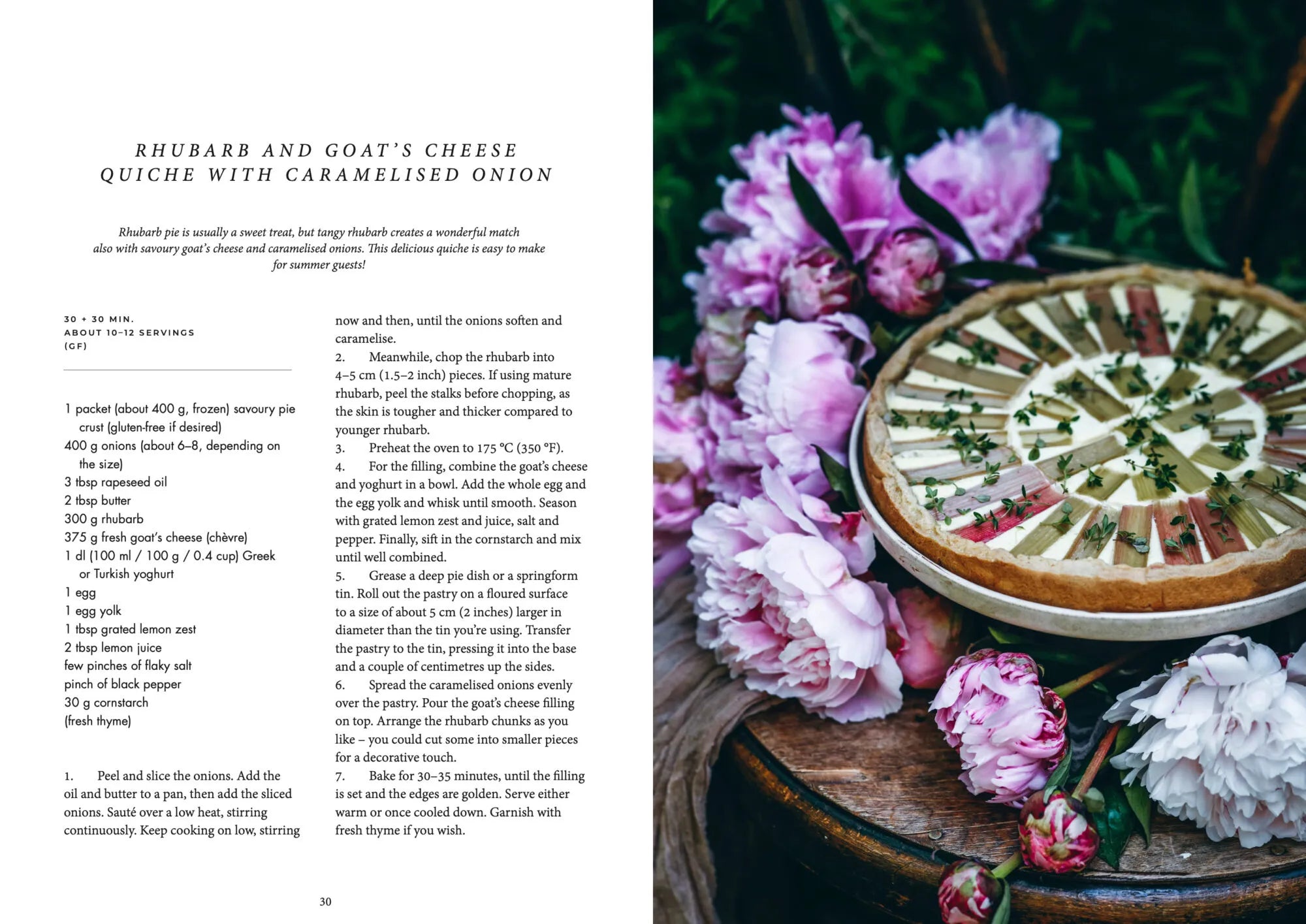 A rhubarb and goat cheese quiche with caramelised onion sits on a wooden board beside pink peonies; the Nordic Summer Cookbook by Cozy Publishing offers recipes like this, perfect for celebrating the summer harvest at midsummer.