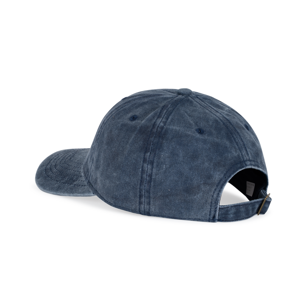 The Sui Ava Everyday Cap in White Sun Faded Blue is shown from the back at an angle, displaying its vintage-inspired worn look and adjustable strap with metal buckle.